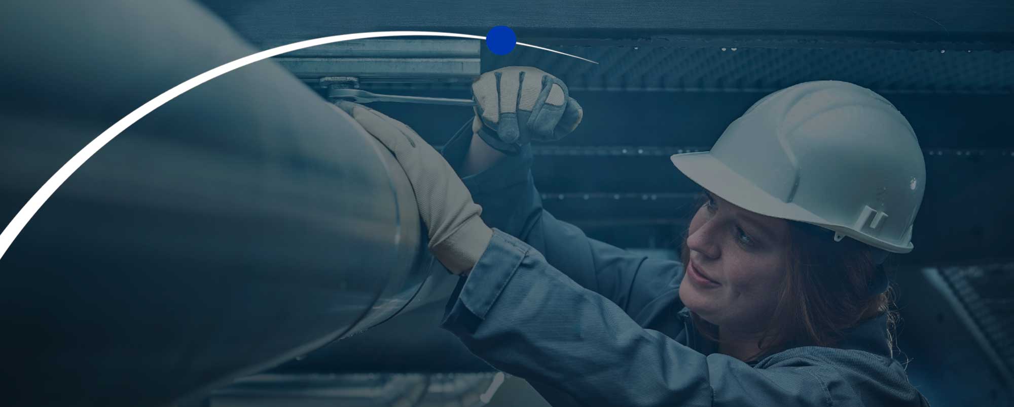 Woman working on a pipe connection