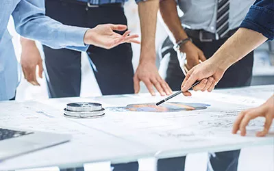 NORMA Group people working in a project